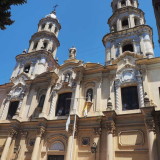 A look up the bell towers of the Nuestra Señora de Belén Church in San Telmo