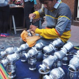 Decorative patterns hammered by hand into these metal mate cups.