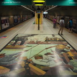 Buenos Aires: 'Subte' subway station Plaza Italia, with large tiled art piece on the floor.