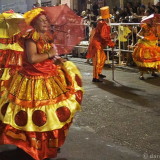 Carnival in Montevideo: several Mamas Viejas and one Gramillero dancing
