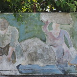 Another rather faded mural in Pan de Azucar. This could depict a couple working in the fields or the yard.