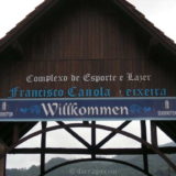 'Willkommen' sign on the local sports and entertainment complex, our camping location in Pomerode.