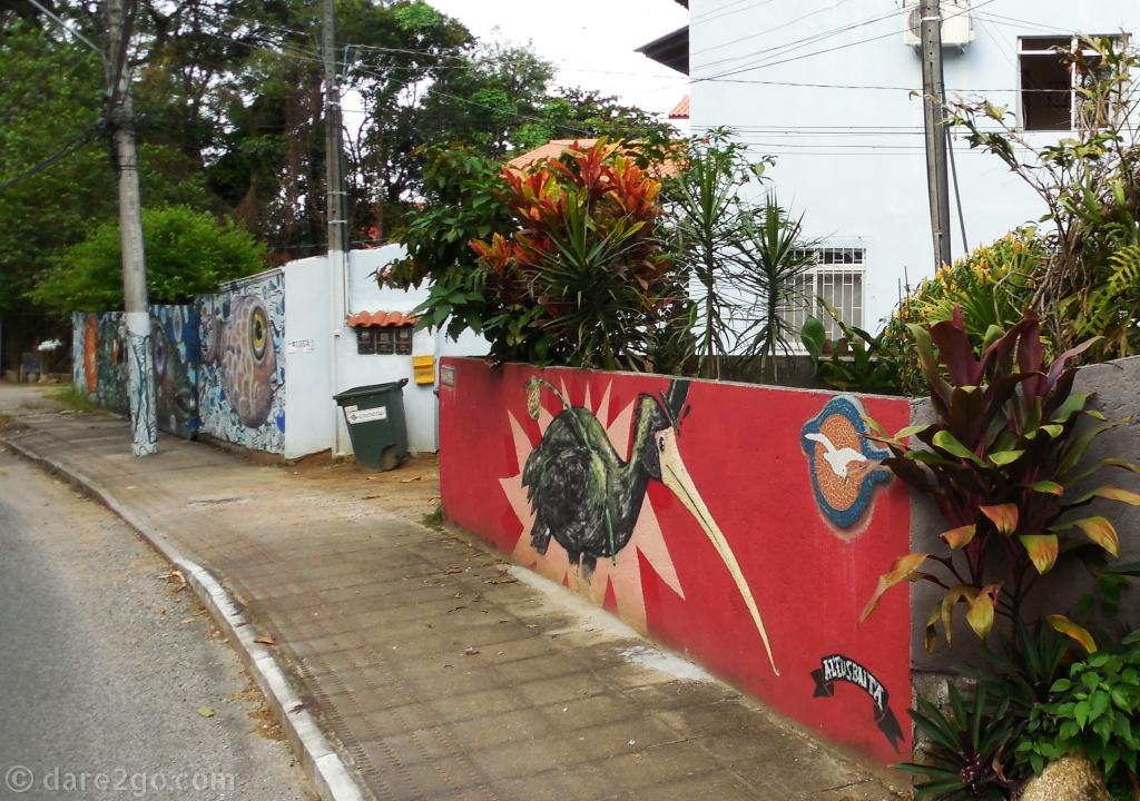 Floripa: decorated power poles and street art walls inland of Ilha de Santa Catarina