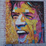 The street-facing wall of a snack bar in Manantiales in Uruguay. I'm still not sure if this is Mick Jagger. What do you think?