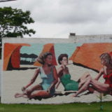 Another piece of street art from a smaller town: we found this 50s/60s inspired beach scene near the river in Mercedes.