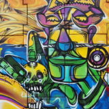 And the seventh section from the left (~ the middle). I don't get the skull shaped spray paint can...