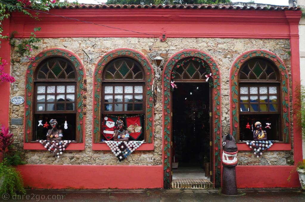 Antonina: this beautiful shop facade with the red painted trim really caught our eye in 2008. The window decoration was so typically Brazilian.