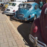 A row of VW Beetle so-called 'Streetmachines', low riders with 'artificial' rust and often tuned engines.