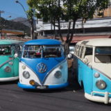 Five split-window T1 Kombi vans in a row. These ones were lowered and otherwise altered (like Samba van windows in part of the roof).