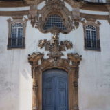 The facade of Igreja Bom Jesus de Matozinhos in the centre of Ouro Preto.