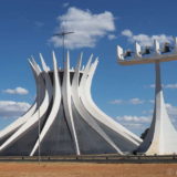 The cathedral of Brasilia. This airy concrete structure was also designed by Oscar Niemeyer. See our inside photo for the colourful stained glass between the concrete columns.