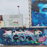 This blue wall is to the left of the 'Valdi Valdi' street art at the waterfront of Florianópolis.