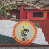 A tile mosaic on the outside wall of the fire department in Antonina.