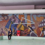 This large scale mosaic is in the entrance section of a corporate office block in Florianópolis. The floor is covered with green mosaic tiles.