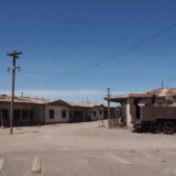 Humberstone World Heritage Site Chile: an old steam locomotive came to rest at a street corner