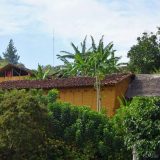 these windowless Wayku houses have tiled roofs