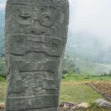 A carved stone stele still standing at the ruins of the Kuntur Wasi Ceremonial Centre.