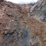 We decided not to continue to Pucallpa. On the way back we snuck through under this fresh landslide - still water and rocks coming down the steep hillside.