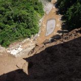 On the road to Pucallpa we encountered countless landslides; for some we had to stop and wait for machinery to clear part of the road. This was Yasha's view out her window whilst I crept along the soggy edge of one such landslide.