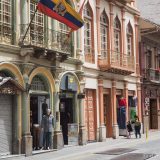 Three in a row, showing doors, windows, balconies and ornate decoration. The architecture of Cuenca is just beautiful.