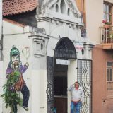 Streetart on the side of a building providing a public toilet. Pretty sure the attendant thought we were photographing him.