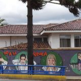 Street art in Cuenca, Ecuador: part of a long wall - "No to violence"