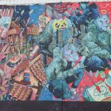 Street art in Loja, Ecuador: it's difficult to distinguish all the details in this part of the colourful school wall.