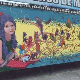 Street art in Loja, Ecuador: look at the detail in this motif on the colourful school wall.