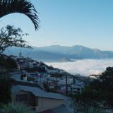 Visiting Zaruma: sunrise over the valley full of low cloud.