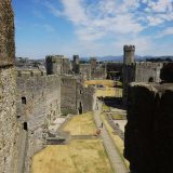 World Heritage Listed castles in Wales: view from one of the towers in Caernarfon. This shows the size of the entire castle complex.