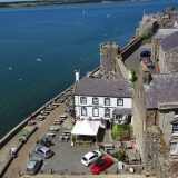 World Heritage Listed castles in Wales: the view from the towers along the fortified town wall of Caernarfon.