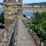 World Heritage Listed castles in Wales: walking along the top of the town wall of Conwy.