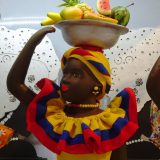Fruit vendors in Cartagena: if you want a souvenir of your visit, maybe take one of these colourful ceramic replicas.