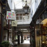 Cardiff: the shops inside the historic arcades are all still in their original form. The decorated galleries and ceilings, and the light fittings, complete the picture.