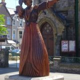 LLandudno: Yasha on the Great Orme, with the historic tram that brought her there. TheLLandudno: proud of their association with Lewis Carol and his famous story of Alice in Wonderland, there are many sculptures of the characters around the town. Here the Queen is probably shouting "Off with her head".