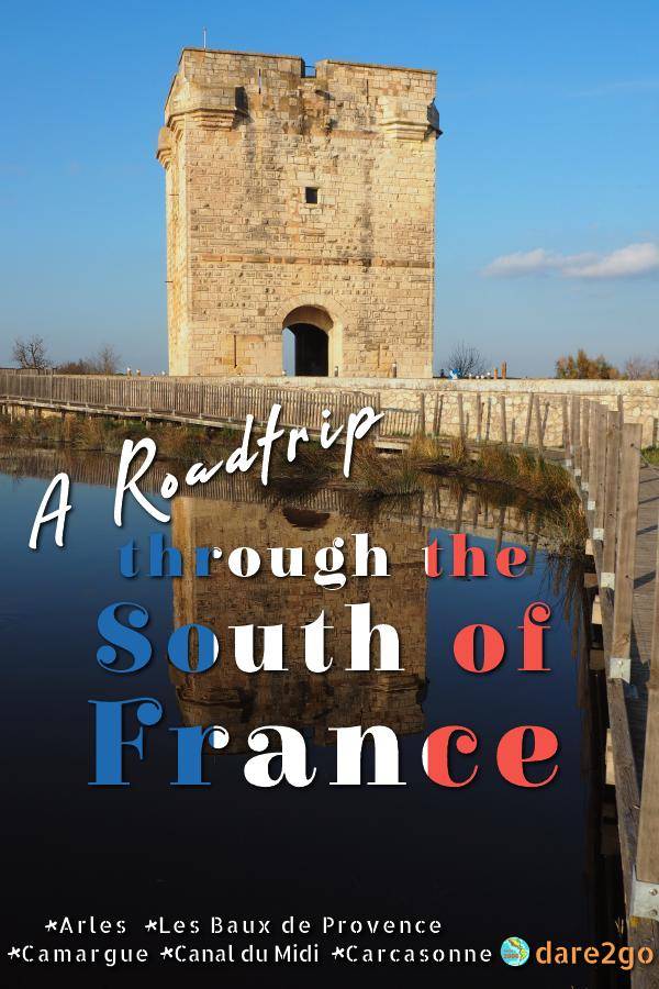 Our PINTEREST image. It shows the Carbonniere Tower reflected in the waters of the Camargue. The image has a text overlay.