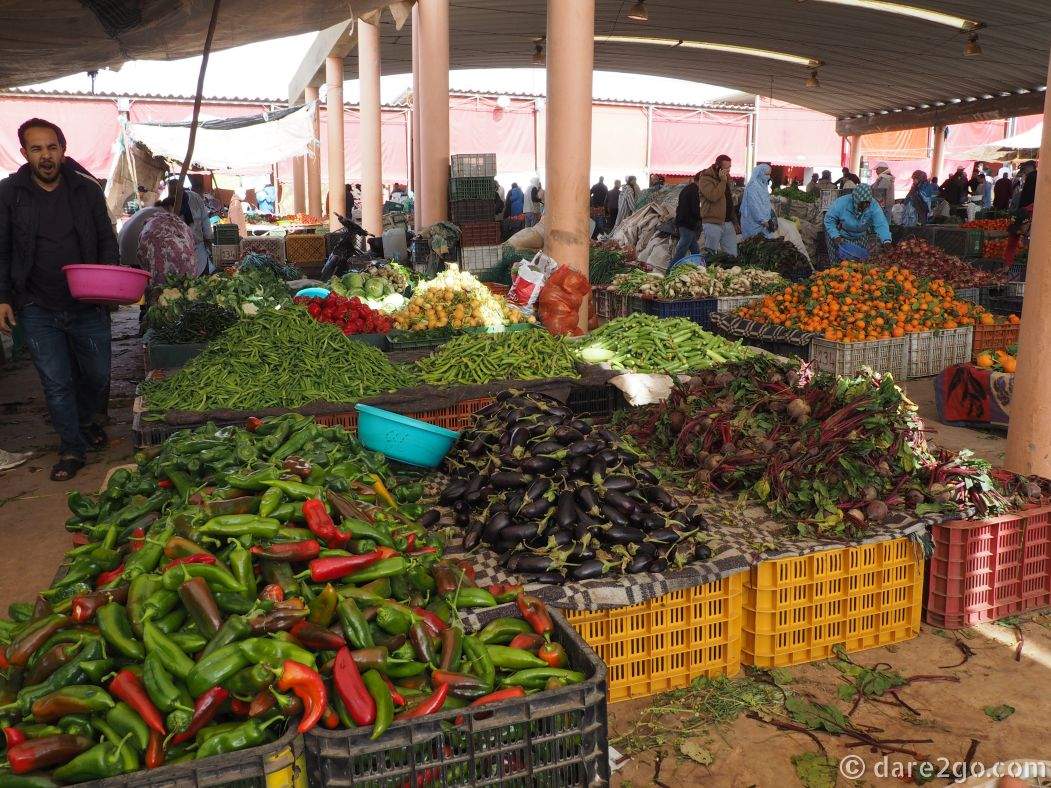 A colourful display of heaped vegetables at a market in Guelmin, Southern Morocco.