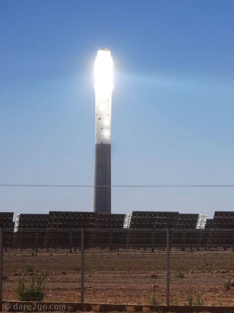 The solar collection tower of the Noor power plant in the desert of Morocco.