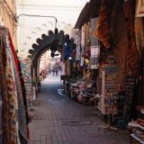The more typical tourist shops in a Souk of Morocco: some carpets, some nick-nacks, and a lot of cheap imported "souvenirs"