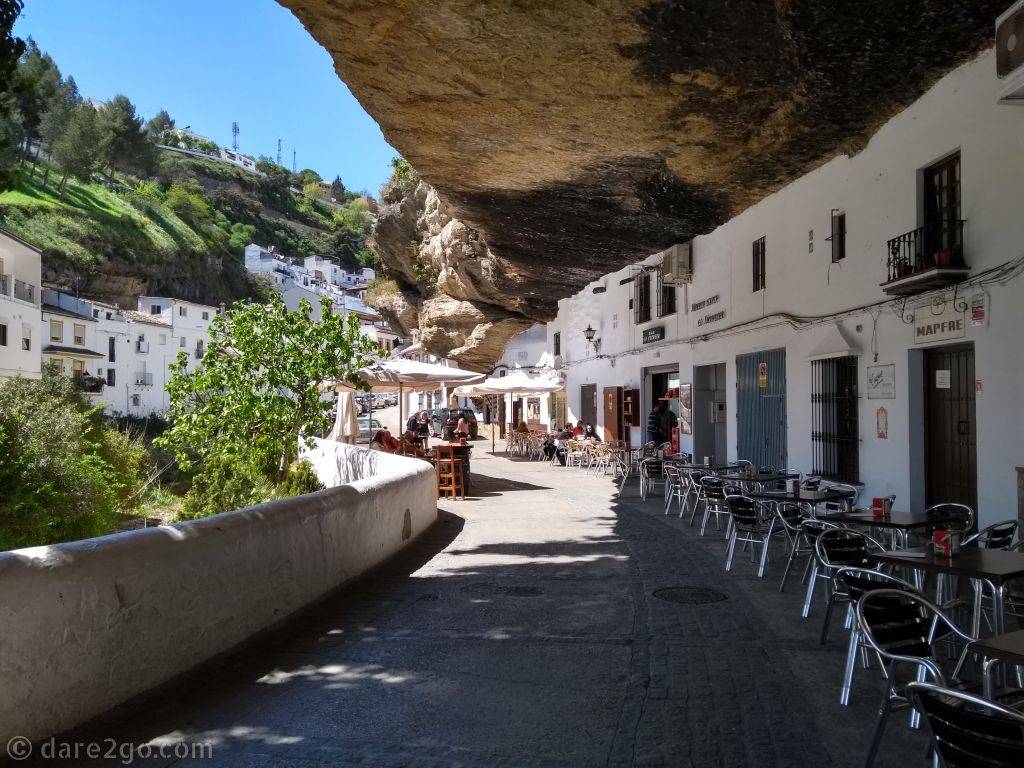 Setenil de las Bodegas: home of 'the house under a rock'. Some refer to these structures as 'cave houses', but they are really built under the rock, with walls to enclose the space as needed.