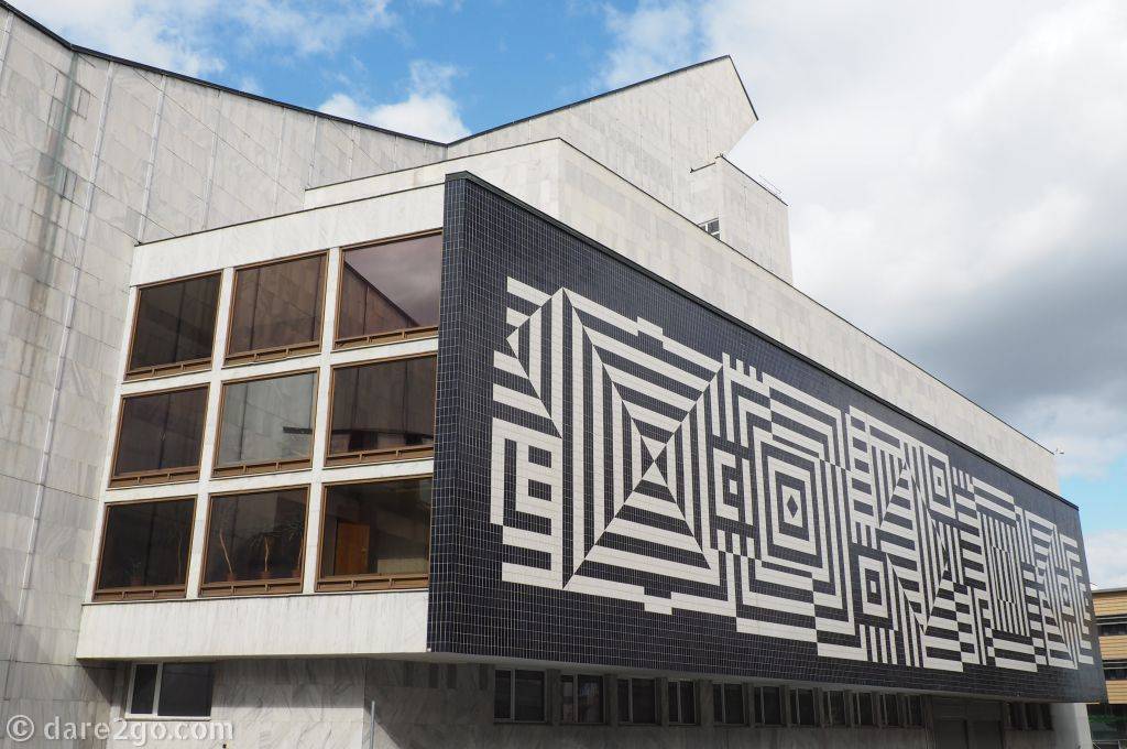 The National Theatre of Győr. Here you can see the tile pattern designed by Hungary's artist Victor Vasarely. On this side it's executed in white on a black backround, the opposite side is the same pattern in black on white.
