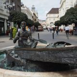 The fountain/sculpture of the "Boatman" is a reminder of the last flood in Győr. A naked man paddles a small flat-bottomed boat. .