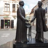 The sculpture of Ányos Jedlik and Gergely Czuczor stands just off Széchenyi Square. These cousins, both Benedict monks, and both came to fame in their fields. Ányos Jedlik was a teacher and inventor; it's claimed that (beside carbonated water) he also invented the first electric motor, although Siemens developed the first commercial version.