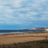 The beach at Sidi Kaouki is a vast expanse of sand. This village is popular with visitors for all kinds of water sports. It was our first stop on our road trip from Essaouira to Agadir.