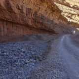 We've left the gorges behind, but now we are following a dry river bed that would be the upper reaches of the Dades River. The road deteriorates as we head towards the higher mountains.