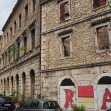 A row of completely destroyed houses at the fringe of the old historic part of Mostar.