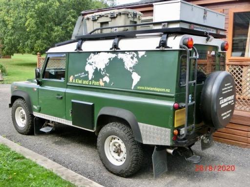The Landy made it back to the UK (Landrover parked in English driveway)