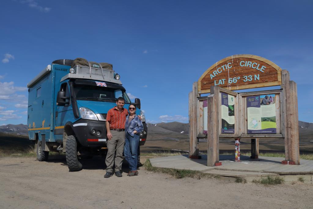 Instead of the end of the Pan-American Highway reaching the Arctic Circle will have to do (Julie and Marcus standing in front of the 'Arctic Circle' sign)