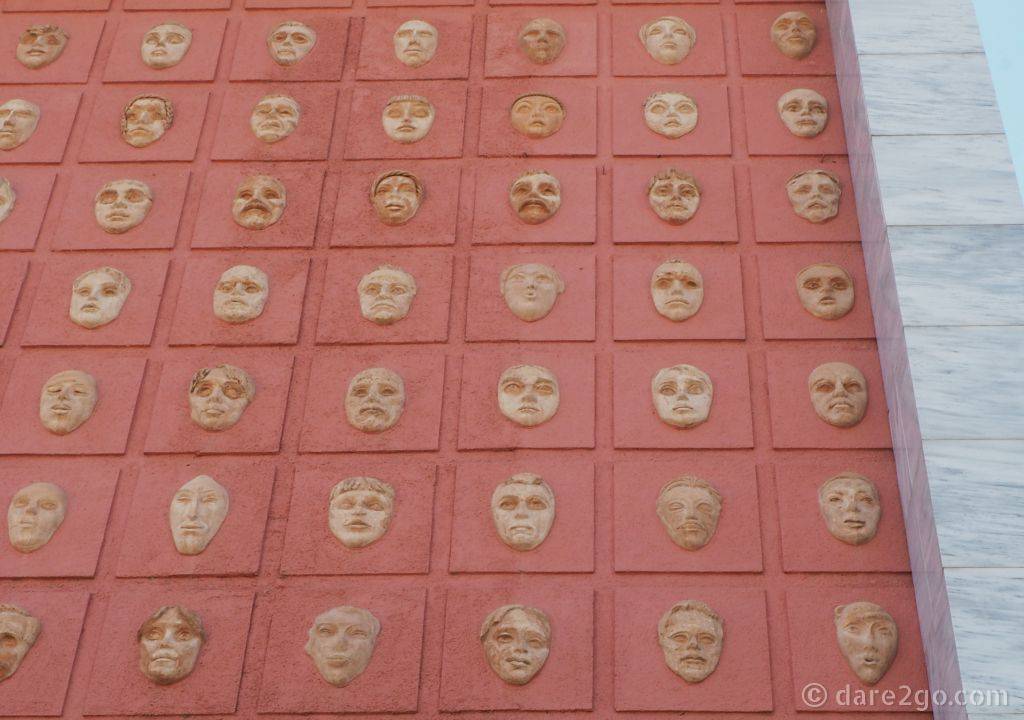 These clay masks, covering the larger middle section of the theatre's facade, are amazing - study the individual expressions and you'll understand why they belong on this facade.