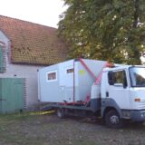 Germany: the end of all the cleaning work and the habitation box tied to a tow truck, which I had initially rented for a day. And then our delivery date in port was moved (when I already was in Bremerhaven) from Friday to Monday... All loaded up - nowhere to go!